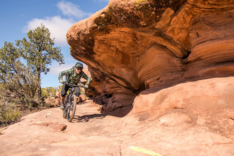 Rippin' it under the overhang near the bottom of Arth's