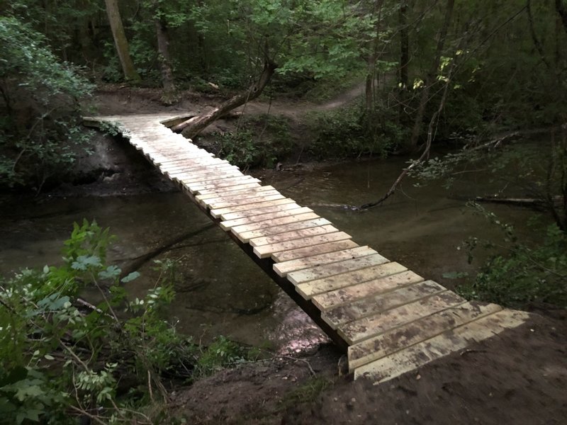 Bridge across Otter Creek - cross to ride all the way around the lakes, or stay on South bank to ride back on the East side of park