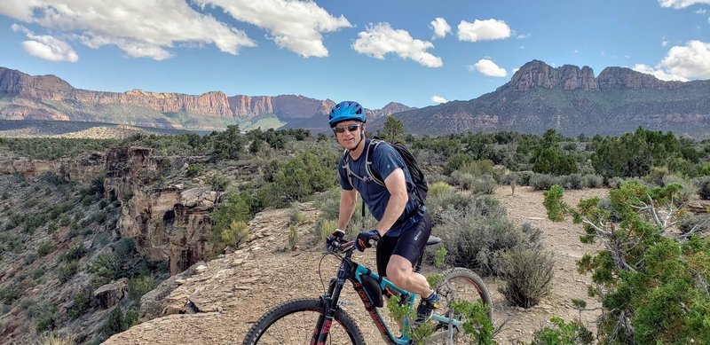 Riding to overlook off the edge of the mesa.