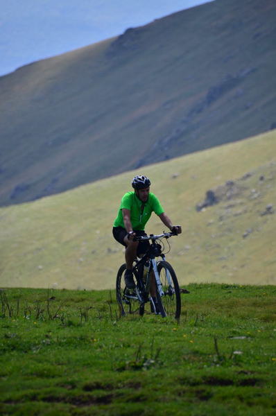 Biker enjoying the flora of the mountainous province Aragats