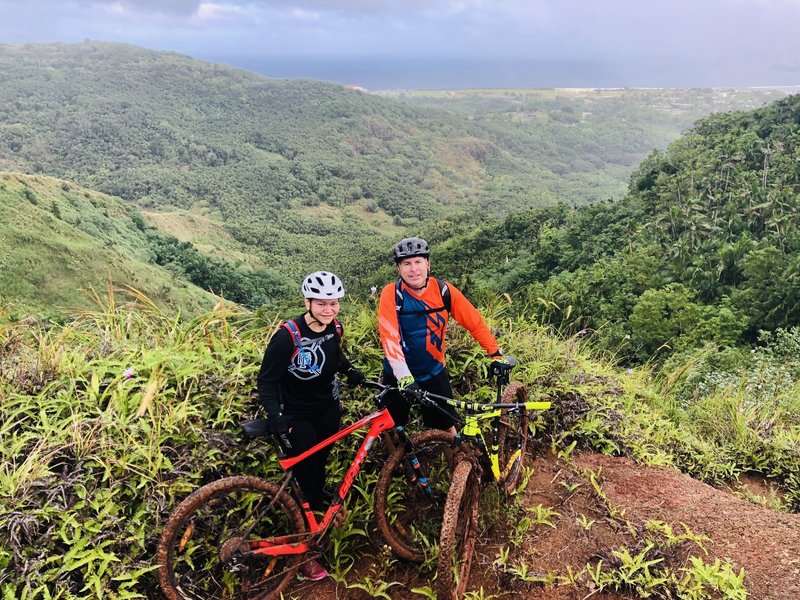 Hidden spot at the top of the Pipeline that is perfect for photos. The village of Maina, Naval Hospital, and the Pacific Ocean in the background.