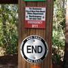 End of trail marker on Promontory Trail in Grassy Waters Preserve.