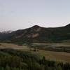 The Divide, South Boulder Creek, Tolland Road, the old school house, and Rollins Pass Road climbing the far mountain from the campsite on 4-N