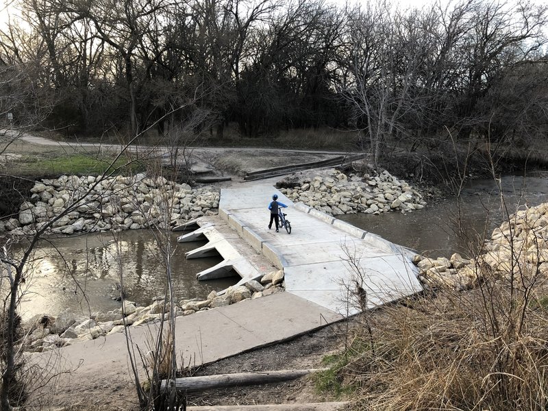 Signage asks that you walk this section of trail in case hiking, biking and equestrians meet up.