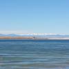 Looking across Aurora Reservoir toward the snow-capped summits of the Indian Peaks Wilderness.