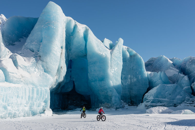 Riding in front of Spencer Glacier