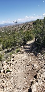 First drop after a long climb from the parking lot.  Lots of loose rocks and tight turns ahead.