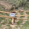 You'll see this sign on your left before you begin the singletrack descent.