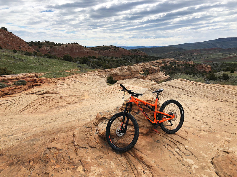 Looking south down the slickrock bench. The trail alternates between rock and dirt passages. Super fun.