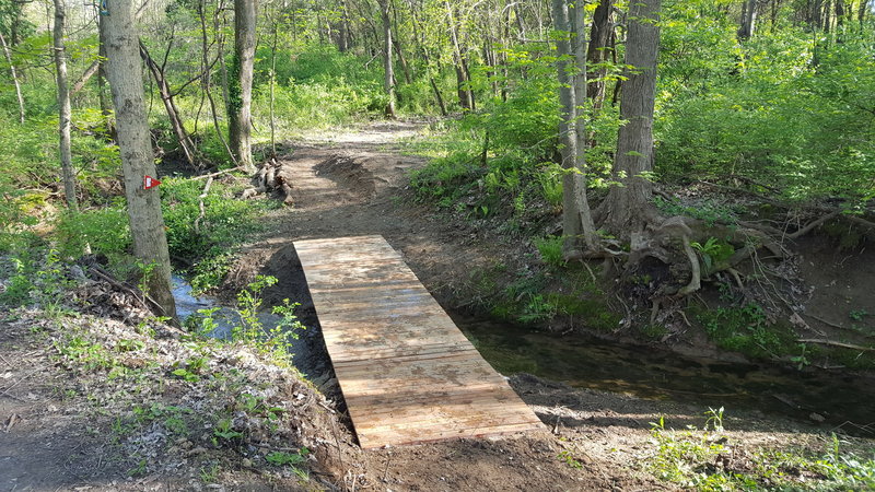 New bridge over creek by pipeline trail