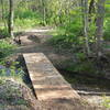 New bridge over creek by pipeline trail