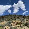 Looking up the hills to the west of the trail near the watering hole.