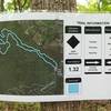 Laminated map tacked to a tree. Riding direction is CCW on Tues, Thurs, and Sat. Clockwise on Mon, Wed, Fri, and Sun.