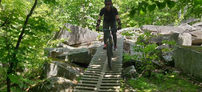 Riding the exit bridge over the granite debris field at start of Roller Coaster.