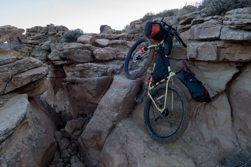 Yes this is on the trail. Sometimes bikepacking means carrying heavy bikes up stuff.