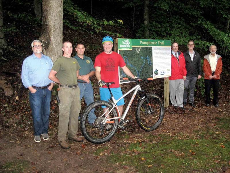 Mountwood Park land managers, trail promoters, trail volunteers ,and Chris McKee of McKee Foods (second from right) at the Pumphouse Trail dedication.