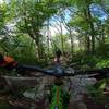 Following Jalen through one of the many rock gardens on Super Natural at Sugar Mountain Bike Park.