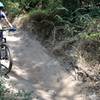 Jen keeping it rolling through dusty ruts. Great trail for the area!