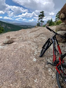 Crawling over another massive sheet of rock working your way up about halfway to Black Jack. Vistas are incredible and the rock is unreal.