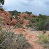 This is at the start of the trail before you reach the fork where you decide, left to go clockwise or right to go counter-clockwise?