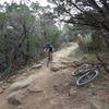 Young rider going down the rocky descent of Venom, just before the jump line along County Road 2341.