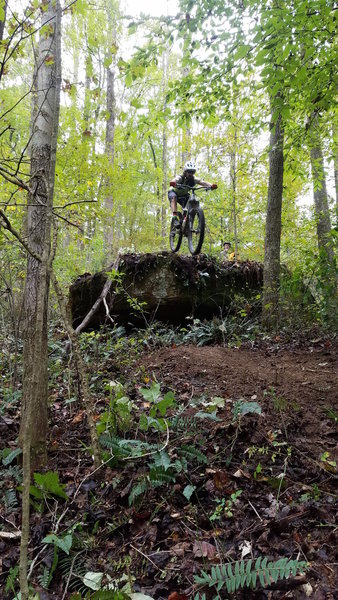 Launching a big rock drop along the Jackson Run Trail!