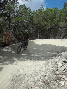 Rider exiting from one of the berms along Recluse.