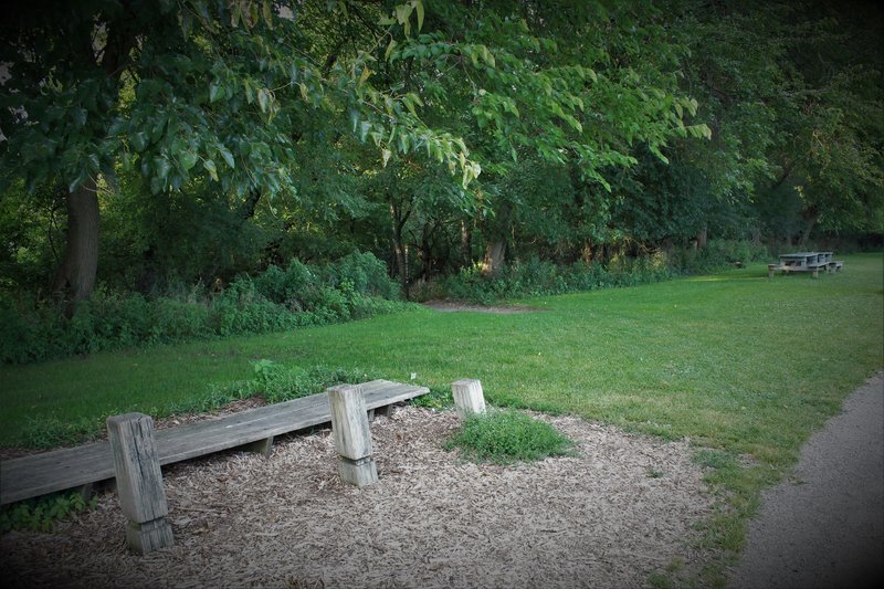 The entrance near Blue Slide is off the paved trail between the bench and picnic table. Trailhead is marked "Bench" but splits shortly below...