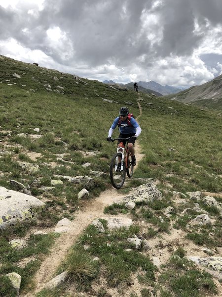 Todd is just over the high point of the CDT above Tunnel Lake, not realizing there is one more climb to come.