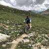 Todd is just over the high point of the CDT above Tunnel Lake, not realizing there is one more climb to come.