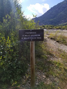 Sign before crossing the river.
