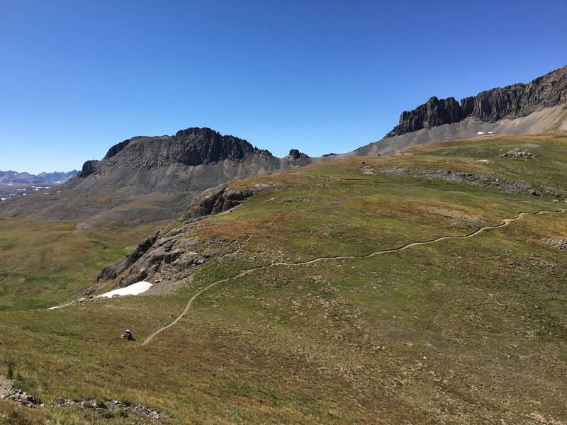 Great view on the trail, here above tree line. You might run into hikers and bikers, but you might be biking by yourself and not seeing anyone for hours. Be prepared; rescue is far away and you're in the wilderness (bear and mountain lion territory).