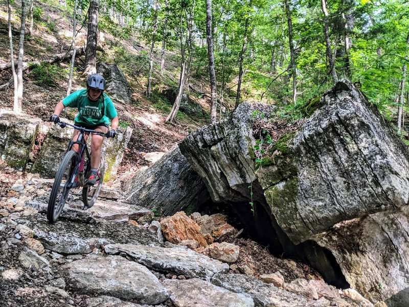 This girl puts the g in gnarly riding through this tehnical rock garden on Atonement.