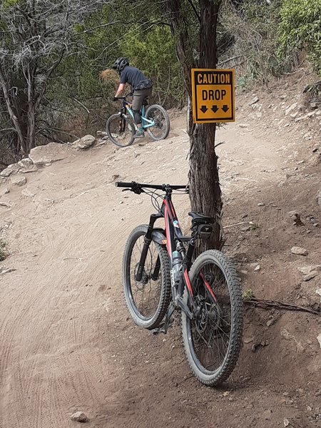 Making the drop into the rock garden on the 3rd/last section of Venom