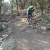 Scott clearing the rock garden and drops just before the jump line on the lower section of Venom