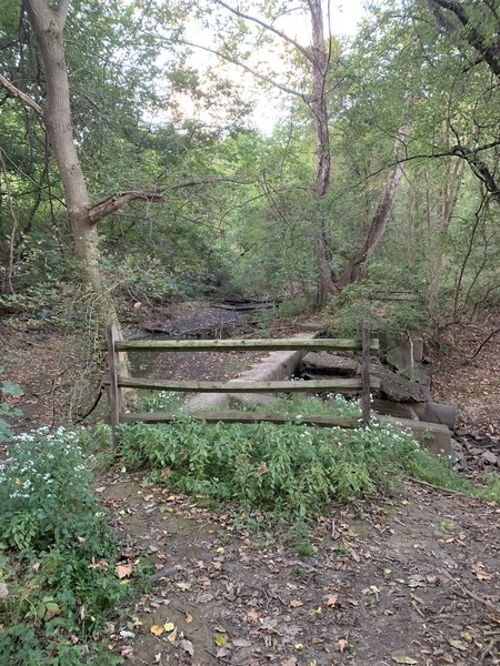 There is a drainage crossing in the trail that is quite technical because of the location of the fences on either end of the concrete. I usually dismount and walk this.