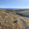 Great views and some short climbs. A few twists and well-maintained. The trail ends at a bench with an overlook. Round trip is about 8 miles, I believe.