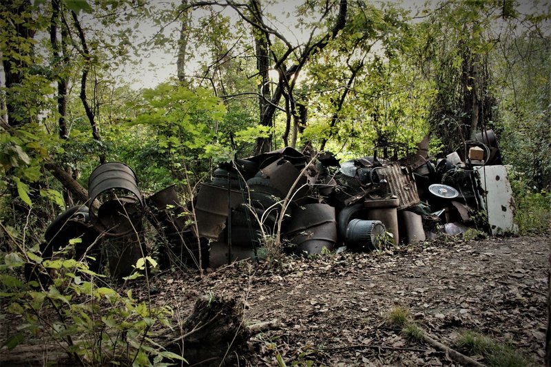 Some halfway thoughtful person pulled a bunch of metal trash from the landfill zone to another part of the trail and built a kind of installation.  Someday, a bunch more folks will have to address any safety hazards and take it the rest of the way out.