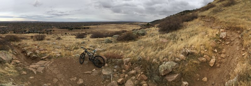 Rock garden section on the descent of Maxwell trail, small rock steps to left and right of the bike pictured.