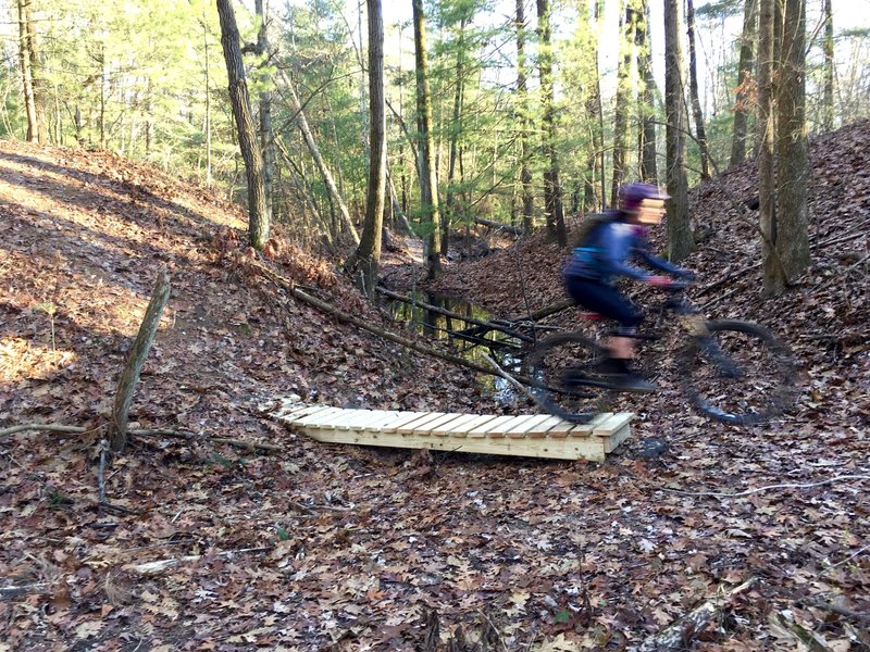 J launching off Zulu Trails bridge/jump.