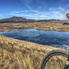 Frozen Bear Lake and Red Rocks on background