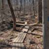 boardwalk through wetland and crossing creek