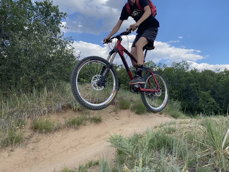 Me getting a bit of air off a big bump, towards the end of Longhorn Ledge.