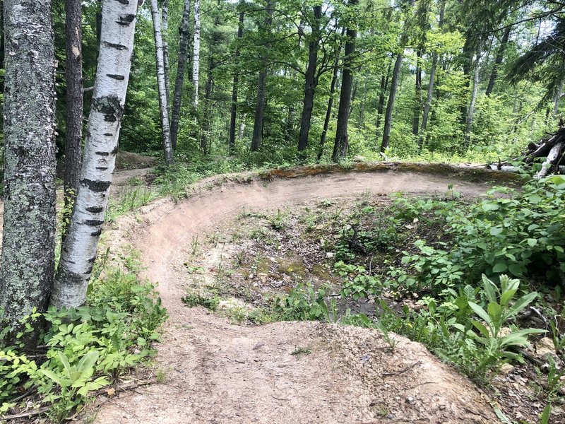 Nice flow, plenty of berms, rollers and rock gardens. Privately owned: contact owner before heading out to the trails.