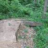 An optional large rock jump on Wild Turkey Trail just east of where it crosses West Bailey Rd.