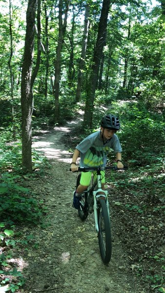 My 10 year old grinding up a hill