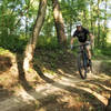 Rider enjoying some pumpy bench cut trail at Creekside.