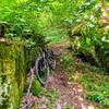 The trail twists through these boulders.