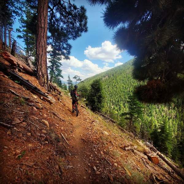 Into the unkown.  Great trail, nail biting exposure.