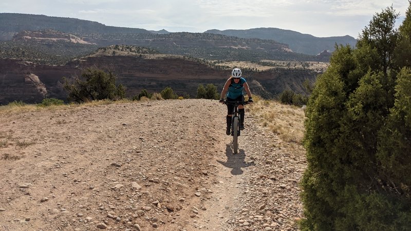 My wife riding up the trail.